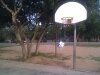 Cube hanging from basketball hoop